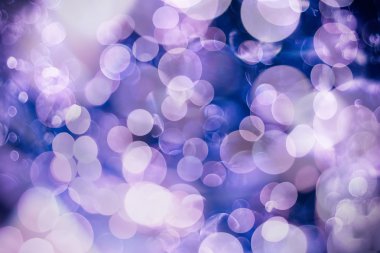 Bokeh ışıkları ve yıldız desenli şenlikli soyut arkaplan