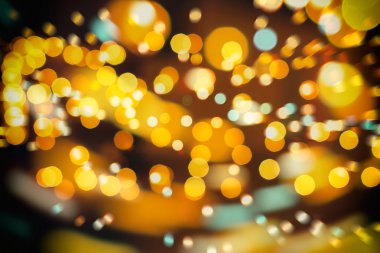 Bokeh ışıkları ve yıldız desenli şenlikli soyut arkaplan