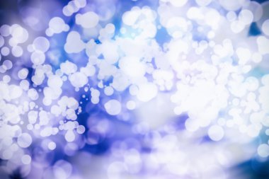 Bokeh ışıkları ve yıldız desenli şenlikli soyut arkaplan