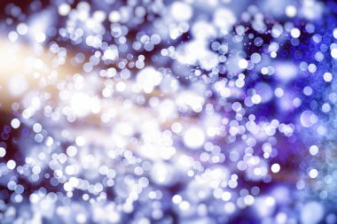 Bokeh ışıkları ve yıldız desenli şenlikli soyut arkaplan