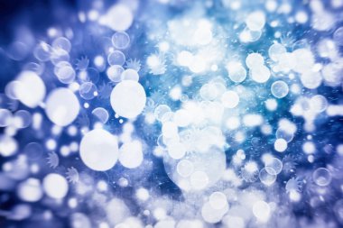 Bokeh ışıkları ve yıldız desenli şenlikli soyut arkaplan