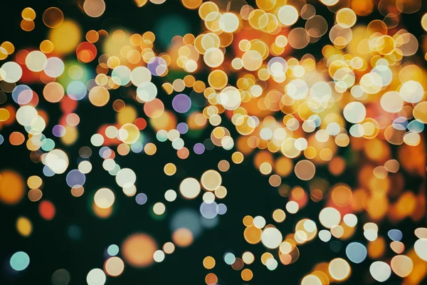 Vánoční pozadí s bokeh světla — Stock fotografie