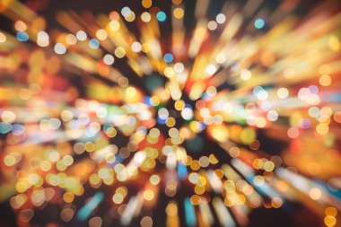 Bokeh ışıkları ve yıldız desenli şenlikli soyut arkaplan