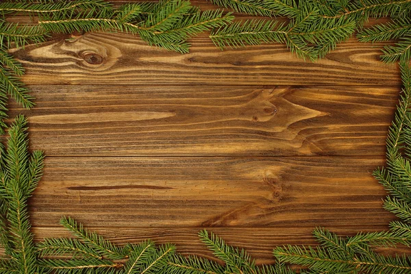 A fából készült táblán a karácsonyfa keret — Stock Fotó
