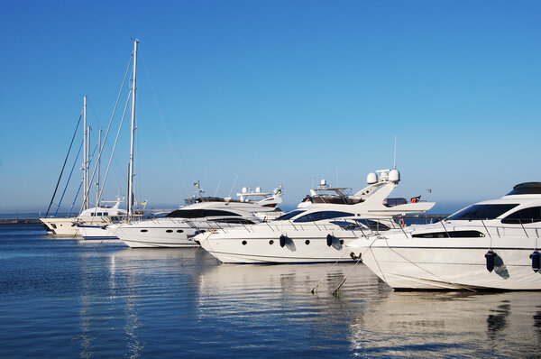 White yachts in the port