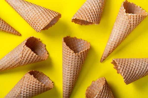 Waffle Empty Ice Cream Cones Yellow Background Flat Lay — Stock Photo, Image
