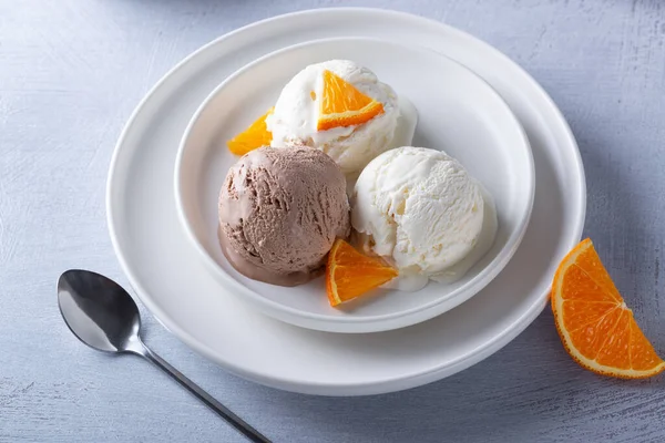 Vanilla Chocolate Ice Cream Orange Slices Plate Light Wooden Table — Stock Photo, Image