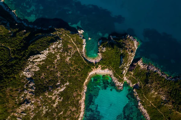 Aerial drone view to Porto Timoni paradise beach with clear teal Ionian sea water. Greece Corfu tropical island. Amazing european seascape. — Stock Photo, Image