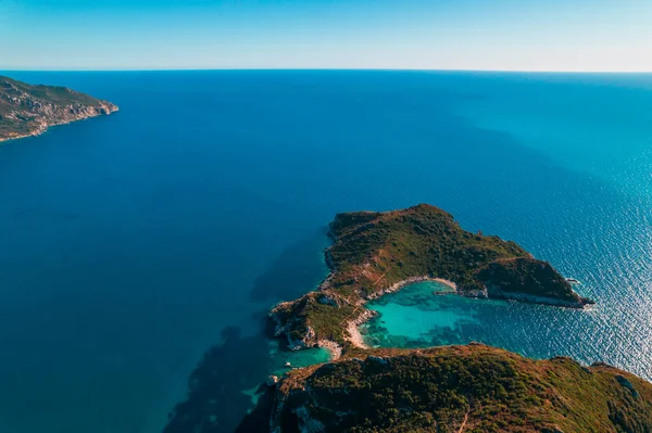Aerial drone view to Porto Timoni paradise beach with clear teal Ionian sea water. Greece Corfu tropical island. Amazing european seascape. — Stock Photo, Image
