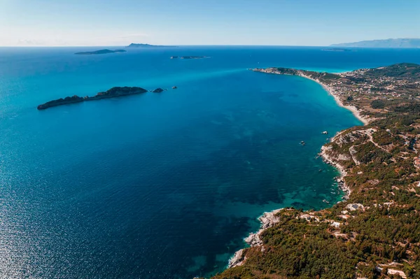 Aerial drone view to seascape with clear blue water. Amazing azure Mediterranean coast background. Travel destination, universal nature, resort, summer vacation. — Stock Photo, Image