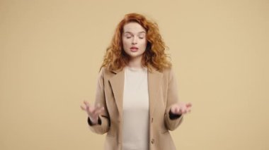 Woman in business formal jacket delivering message with positive and trustworthy expression. Blogger presentations, vlogging, social media content, online education, customer support presentation.