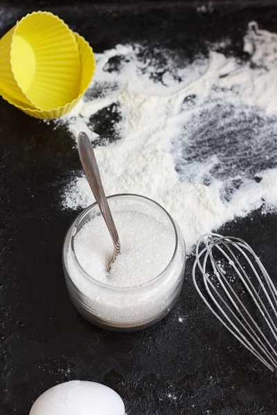 Ingredients for a cake on black stone