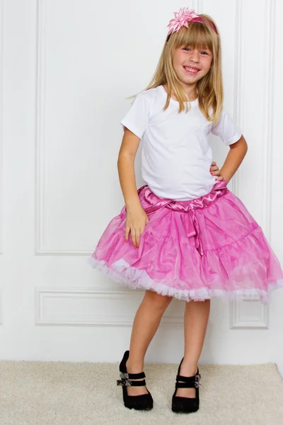 Girl in a pink dress — Stock Photo, Image