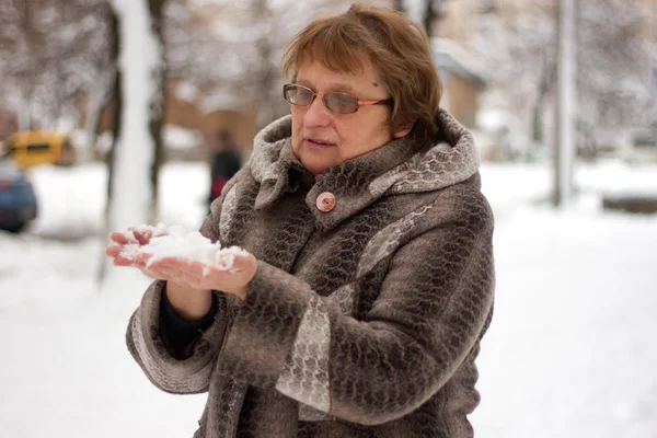 Mature woman in winter clothes — Stock Photo, Image