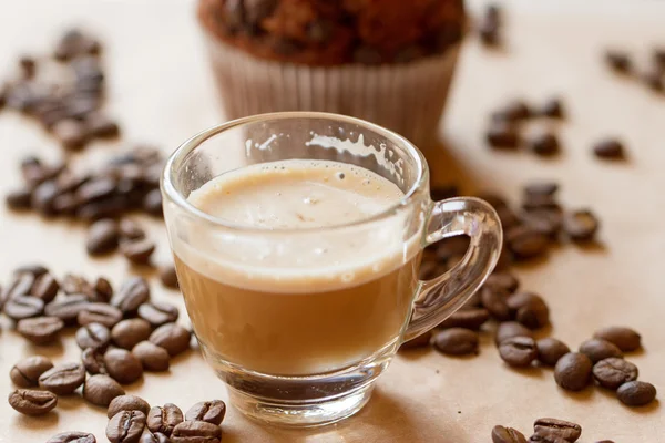 Csésze kávé és a biscotti latte — Stock Fotó