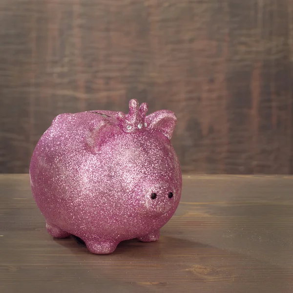 Pink piggy bank with spangles — Stock Photo, Image