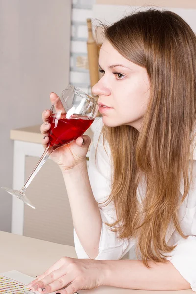 Woman drinking red wine — Stock Photo, Image