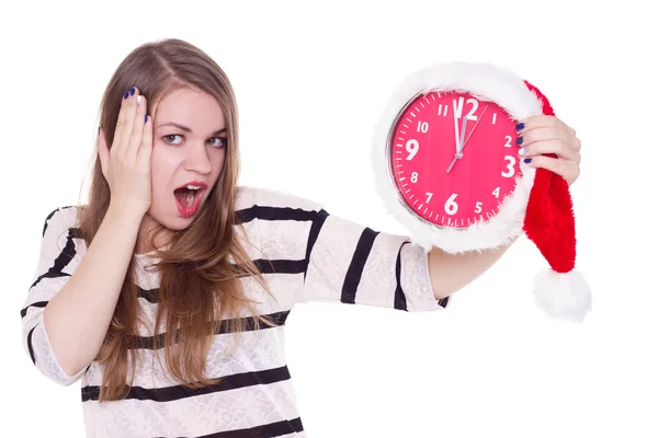 Jeune femme en santa chapeau avec horloge isolé — Photo