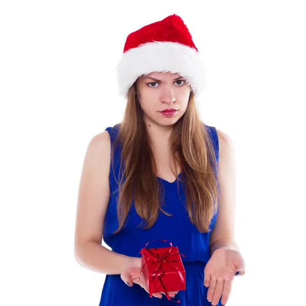 Girl in Christmas hat gift upset. On a white background — Stock Photo, Image