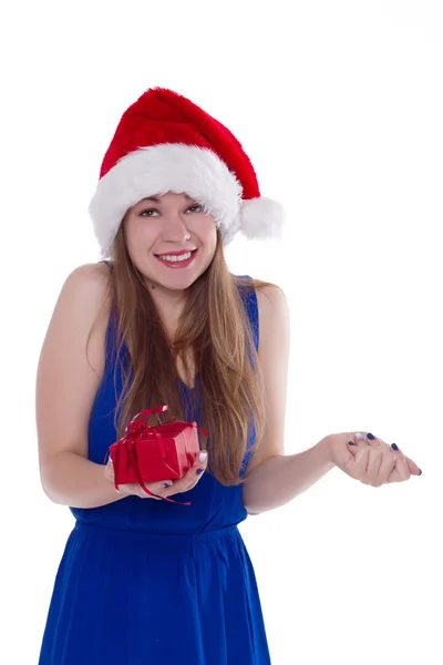 Girl in a Christmas cap gift to rejoice — Stock Photo, Image