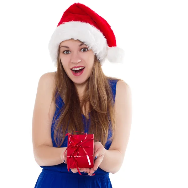 Chica en un regalo de gorra de Navidad para regocijarse — Foto de Stock