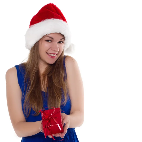 Girl in a Christmas cap gift to rejoice — Stock Photo, Image