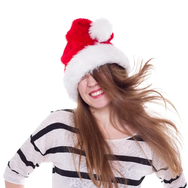 Экспрессивная эмоциональная девушка в рождественской шляпе на белом фоне — стоковое фото
