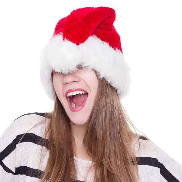 Expresiva chica emocional en un sombrero de Navidad sobre fondo blanco —  Fotos de Stock