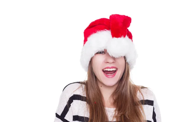 Expressive emotional girl in a Christmas hat on white background — Stock Photo, Image