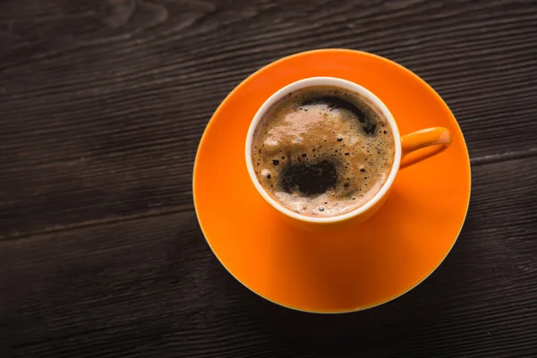 Orange cup of coffee — Stock Photo, Image