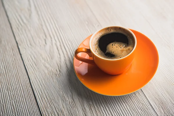 Orange Tasse Kaffee — Stockfoto
