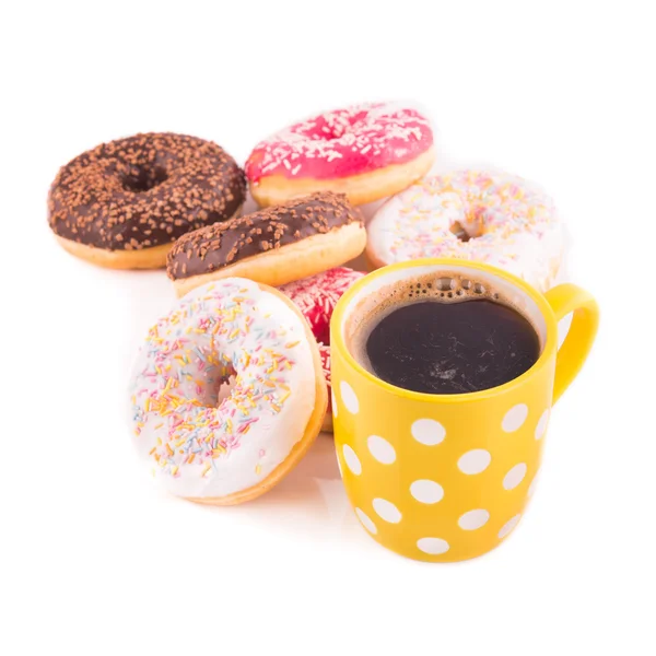 Café y donuts deliciosos — Foto de Stock