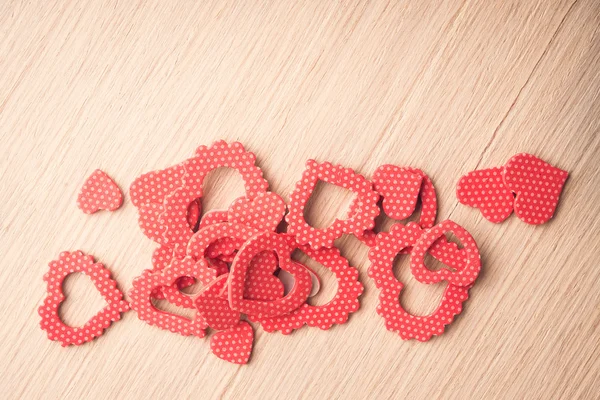 Hearts shape symbol on wooden background — Zdjęcie stockowe