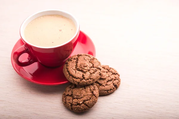 Tasse mit Kaffee und Schokolade-cookie — Stockfoto