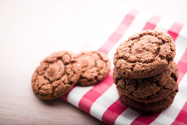 Chocolate cookies on napkin — Stock Photo, Image