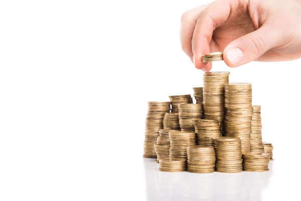 Businessman holding pile of gold coins — Stock Photo, Image