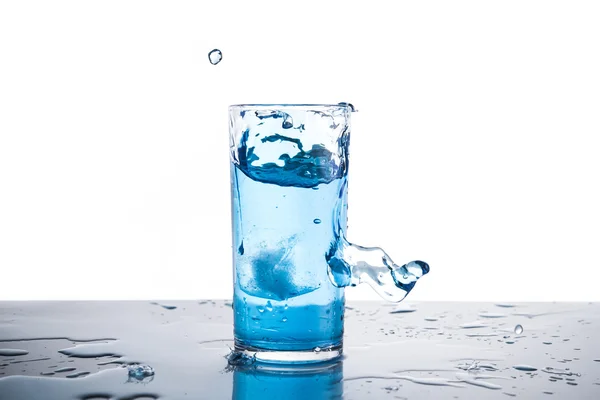 Water splash in glass isolated — Stock Photo, Image