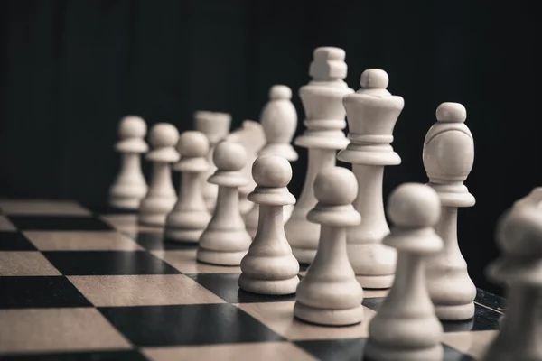 Chess figures on chessboard — Stock Photo, Image