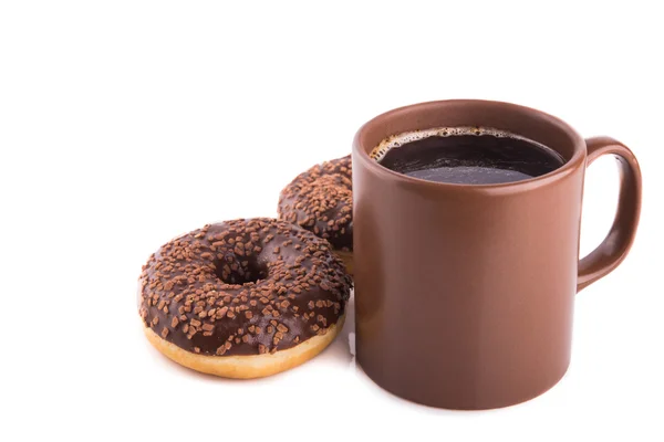 Café y donuts deliciosos — Foto de Stock