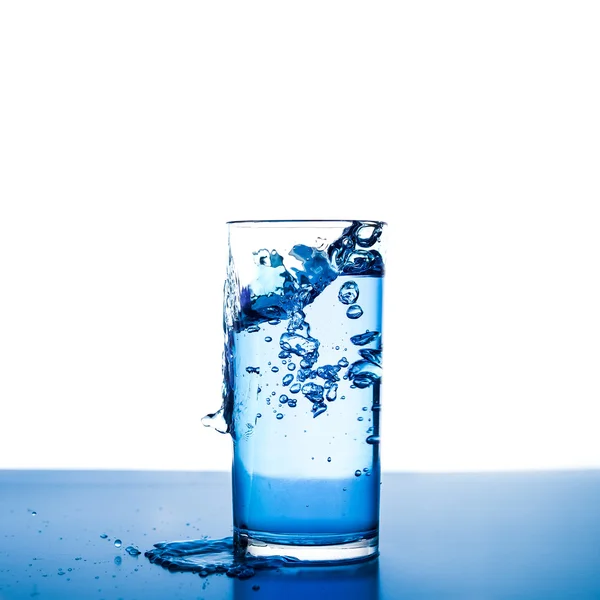 Pouring water into glass — Stock Photo, Image