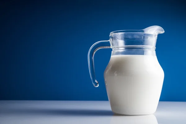 Decanter with fresh milk — Stock Photo, Image