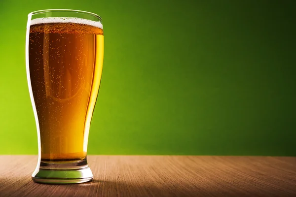 Glass of light beer — Stock Photo, Image