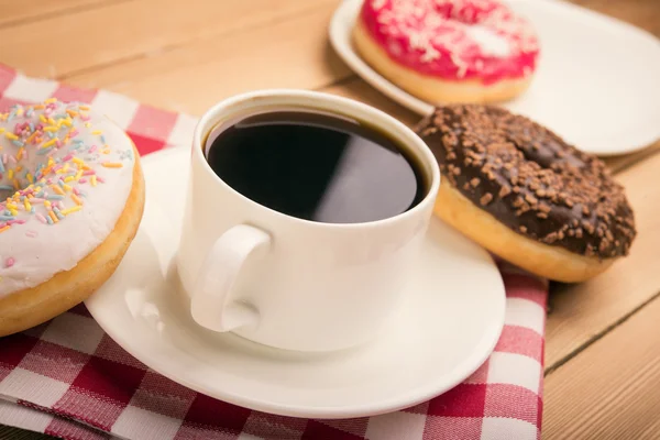 Coffee and sweet donuts — Stock Photo, Image