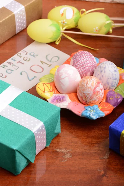 Holiday gift box with painted easter eggs — Stock Photo, Image