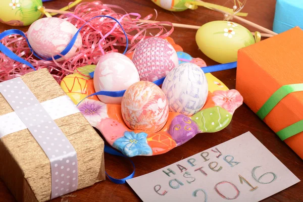 Holiday gift box with painted easter eggs — Stock Photo, Image