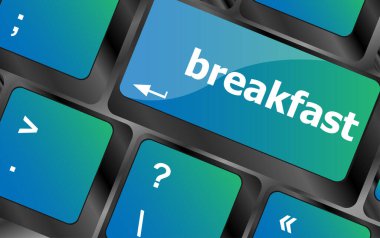 Bilgisayar klavyesinde kahvaltı kelimesi. dizüstü