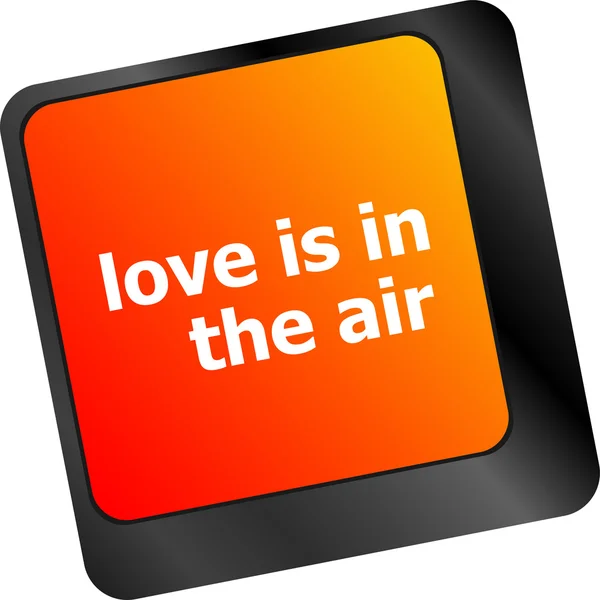 Moderna tangentbord med kärlek är i luften texten — Stockfoto