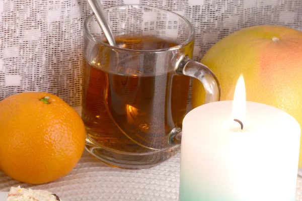 Fruits and candle — Stock Photo, Image