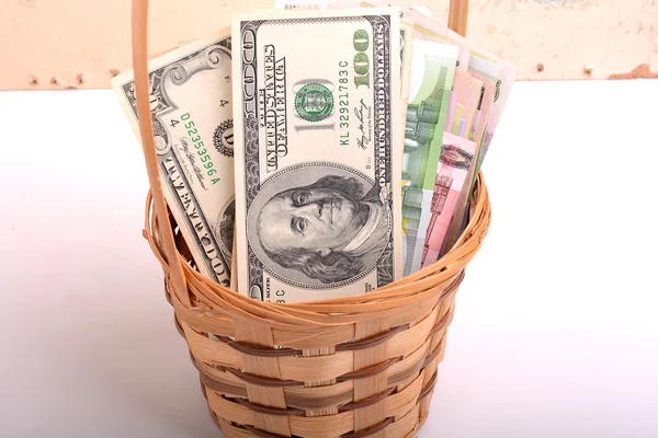 Money set in a basket, dollars, euro and ukrainian money — Stock Photo, Image