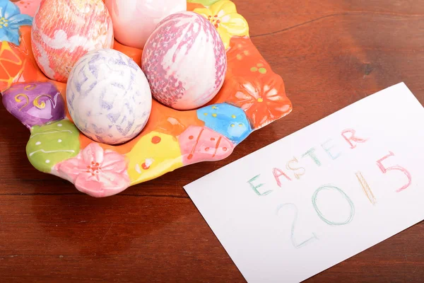 Easter setting with gift box and spring decoration — Stock Photo, Image